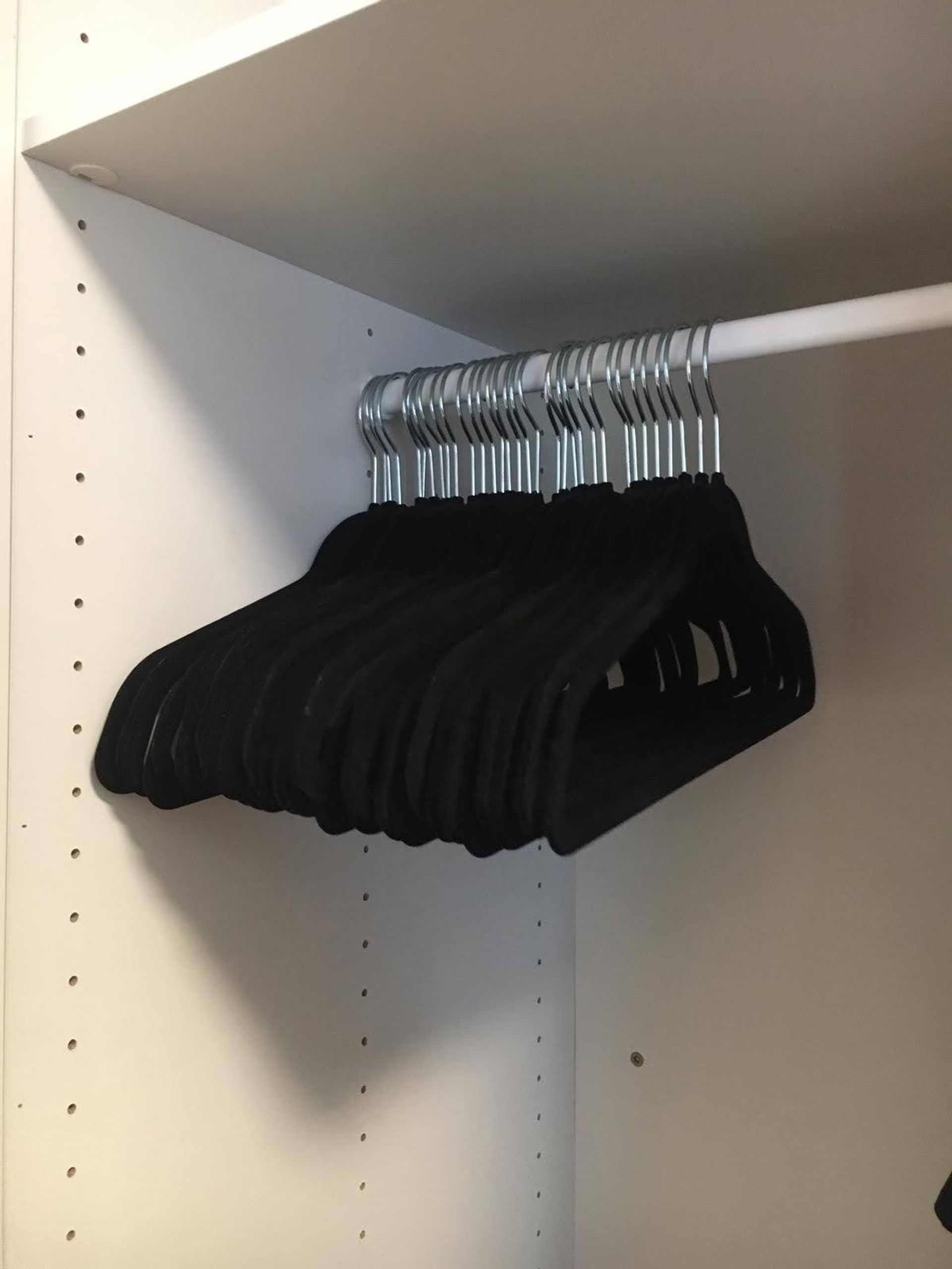 Clothing hangers on a clothing rail