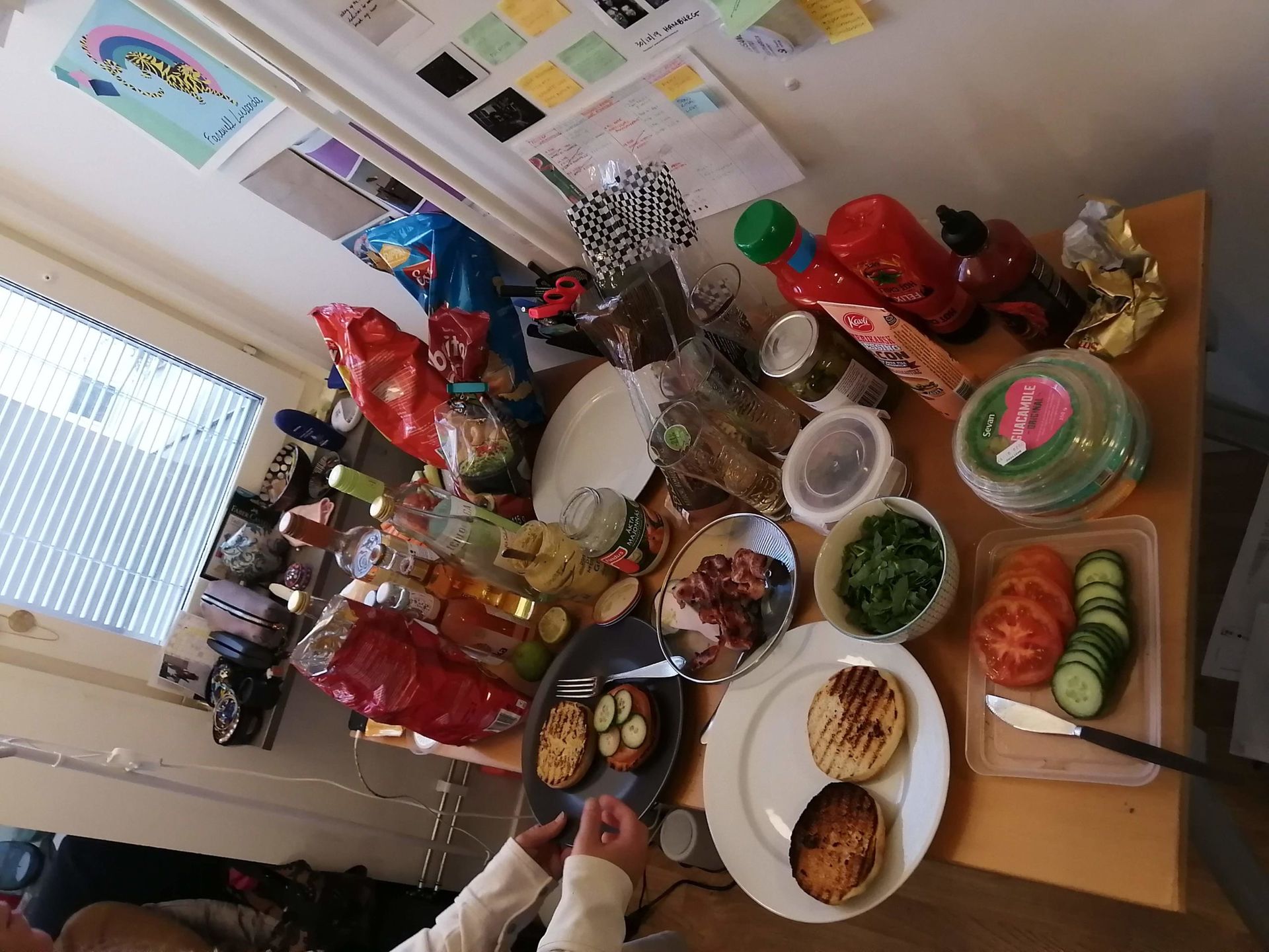 A desk filled with plates of food