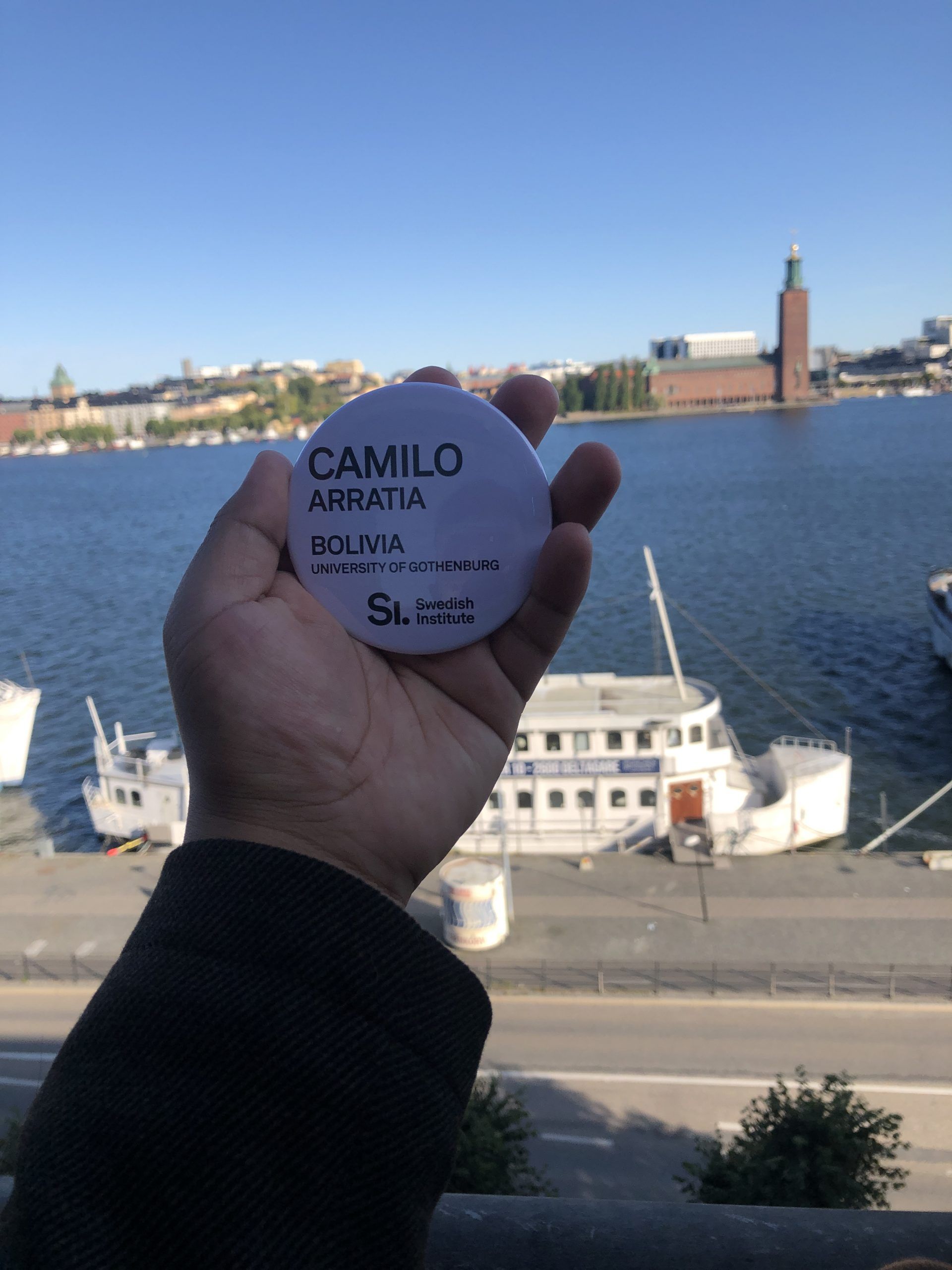 A sticker in front of the stockholm skyline