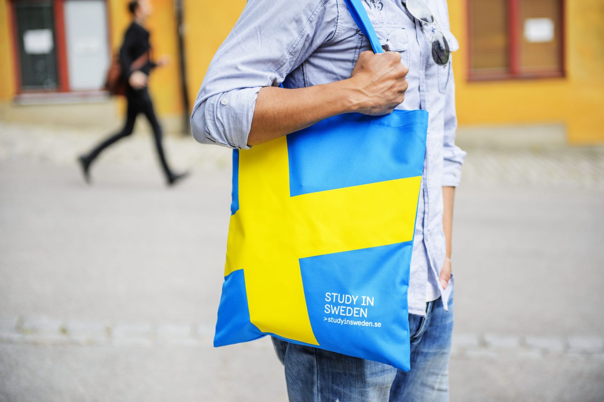 student carrying bag