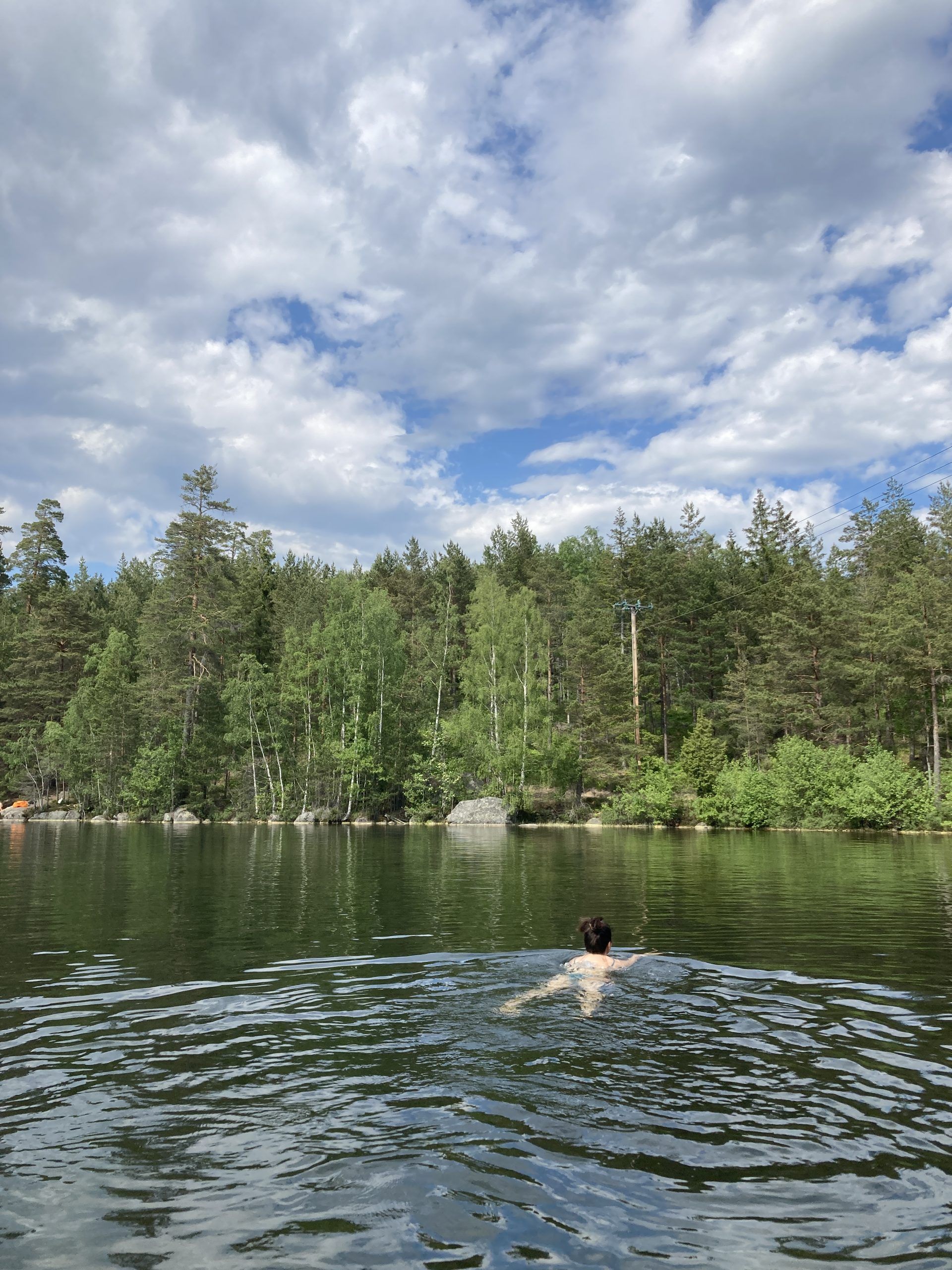 photo of girl swimming