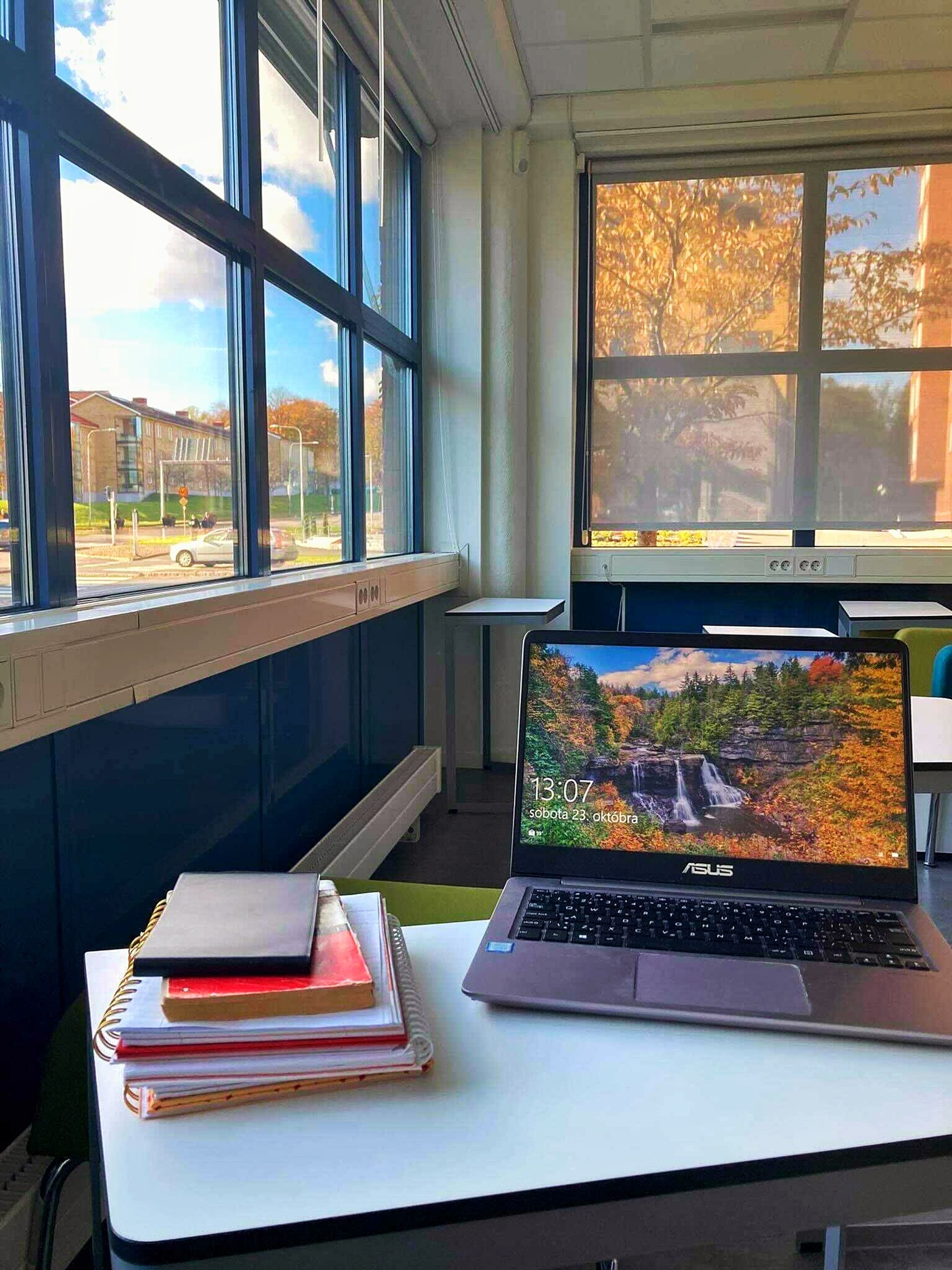 A photo of a study set-up in a room with big windows in the University Library.