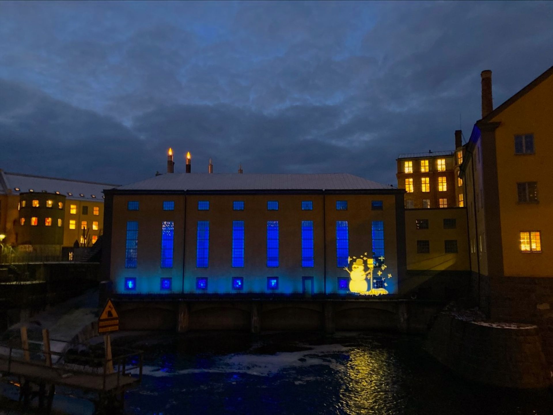 snowman projected onto building