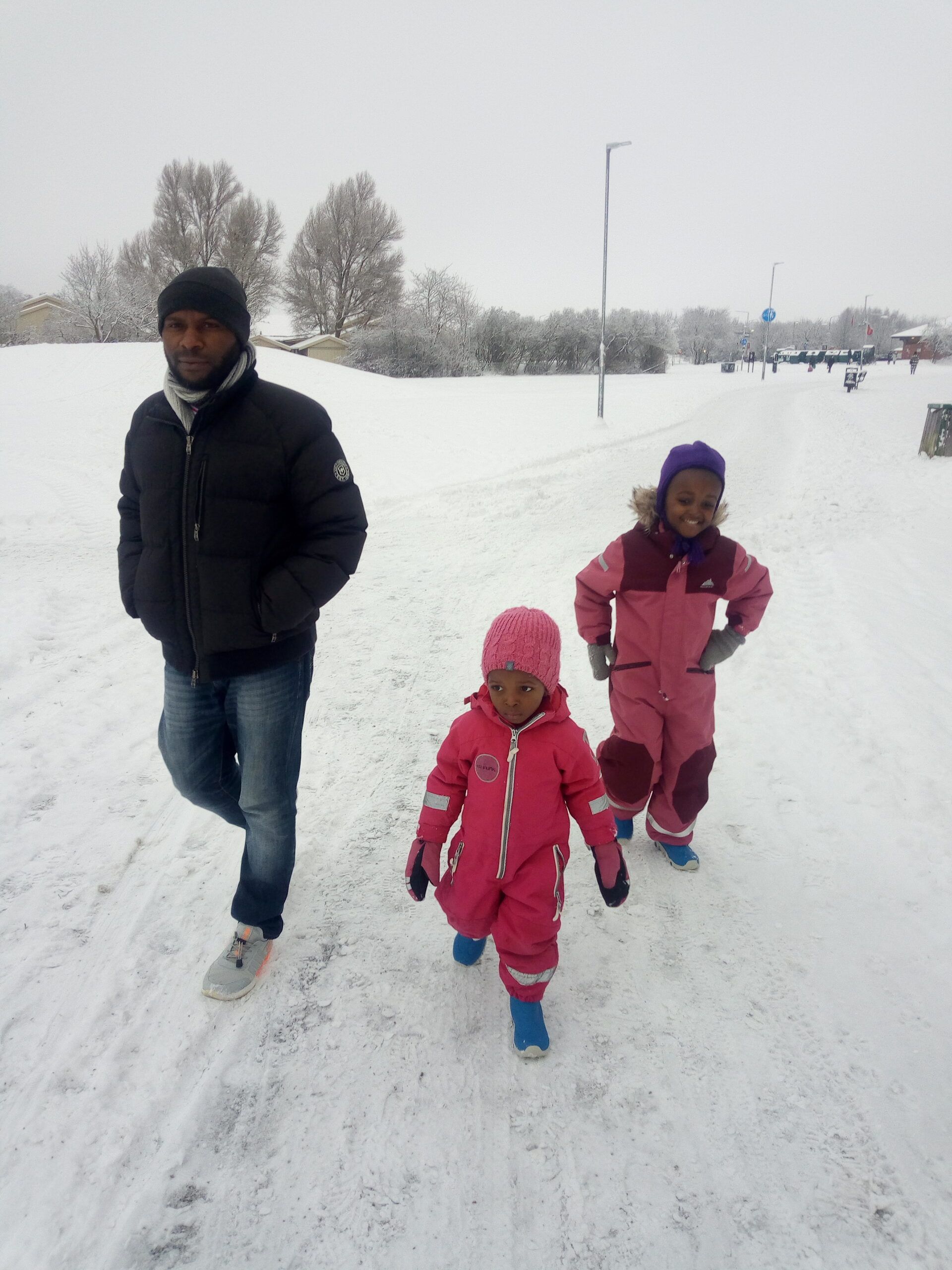 Uppsala Student, Regis, with his two children