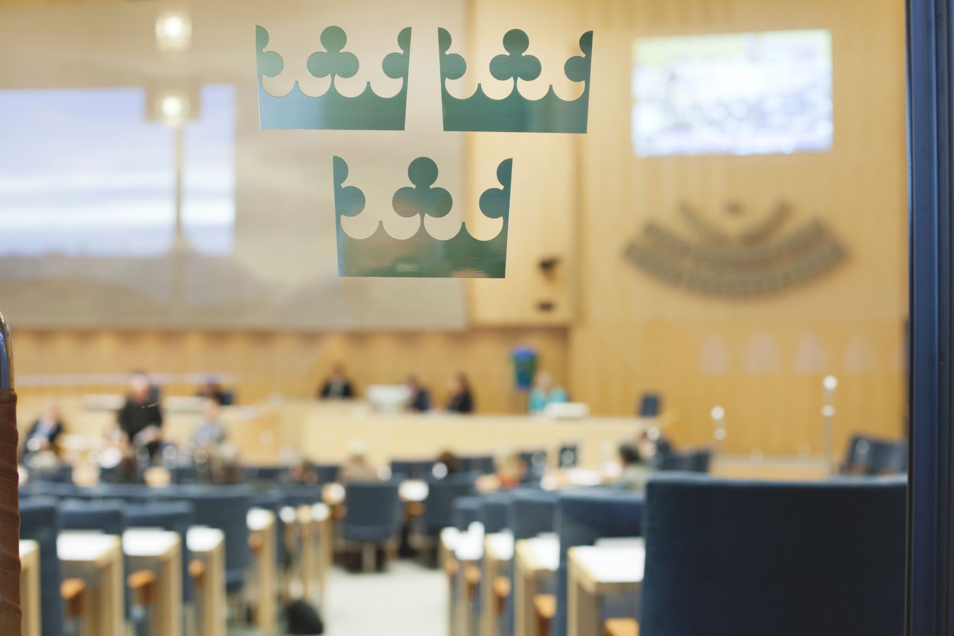 The Swedish Parliament behind a glass window.