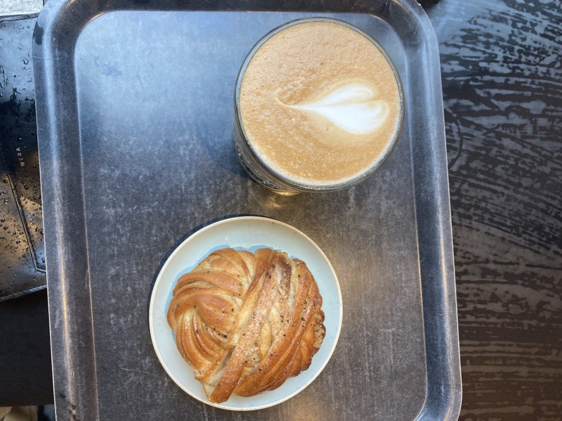 Picture of a pastry and a latte 