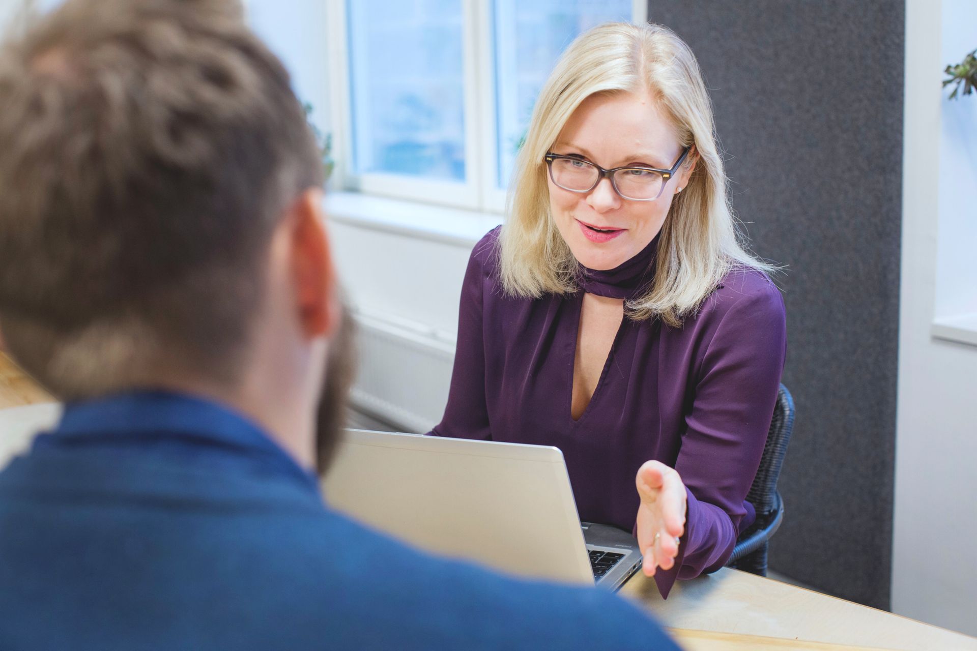 woman interviewing man