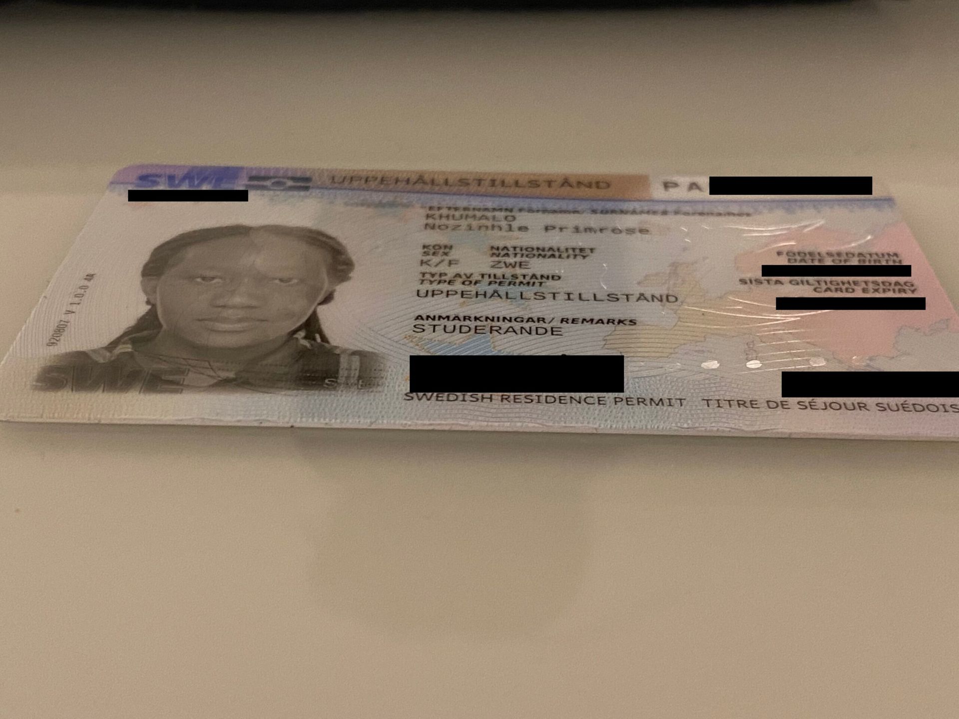 A Swedish residence permit card.