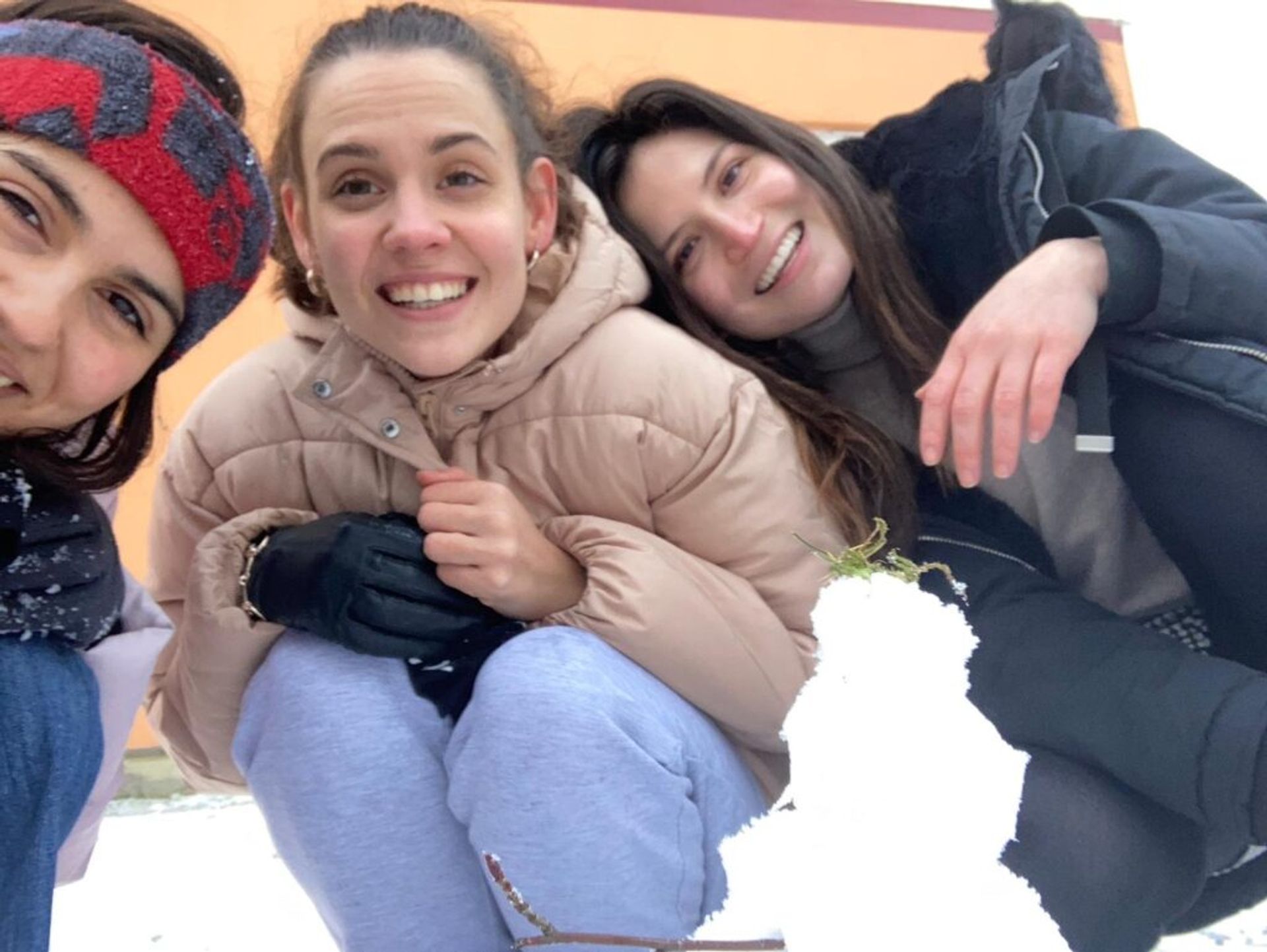 3 girls taking a selfie. 