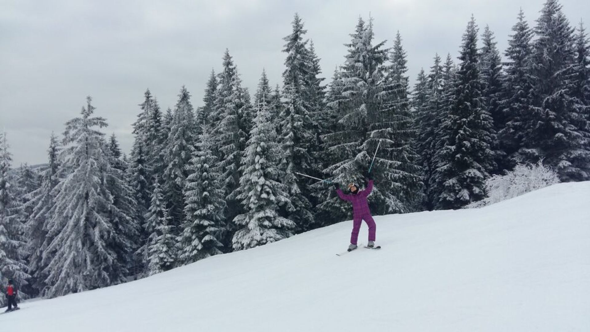 A girl on a ski slope. 