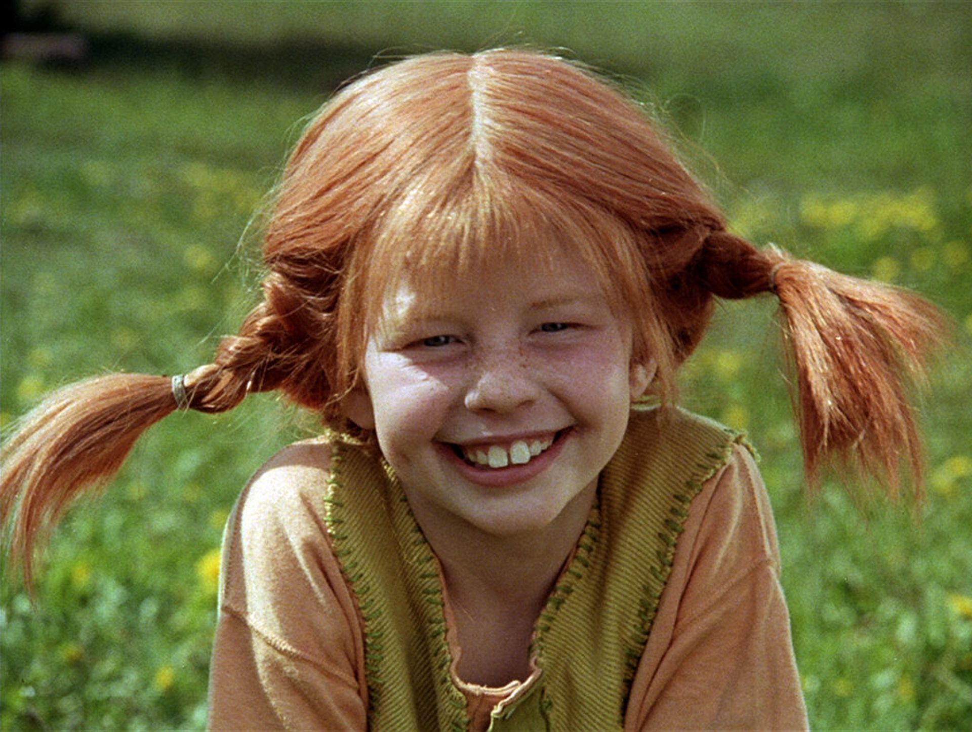 A portrait of the red-haired character Pippi Longstocking.