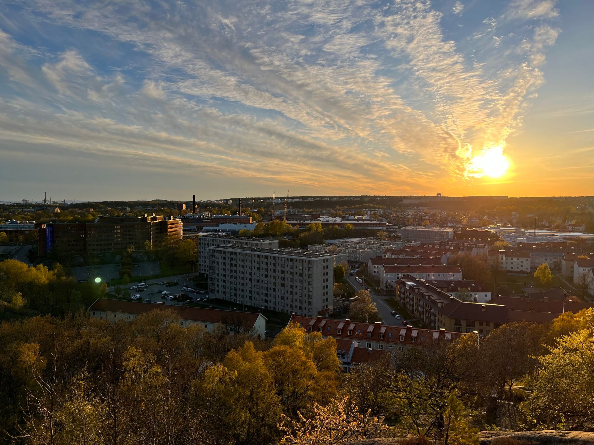 A sunset overlooking a Swedish city landscape.