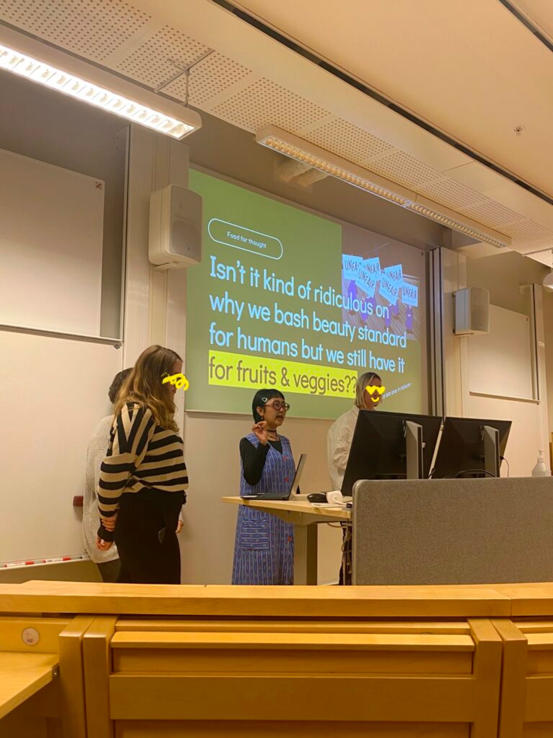 A student doing a presentation in a classroom setting.