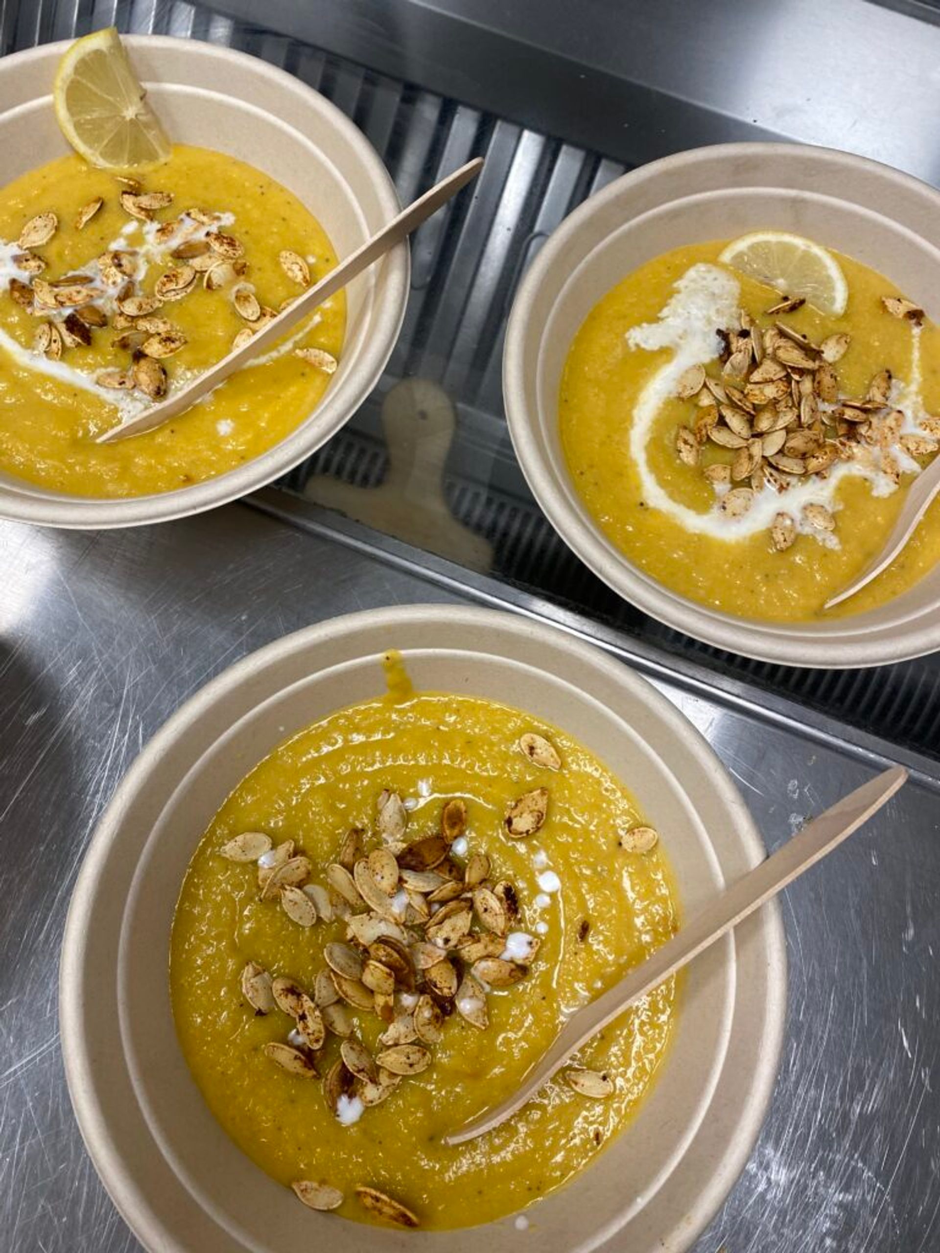 Freshly made pumpkin soup topped with pumpkin seeds.