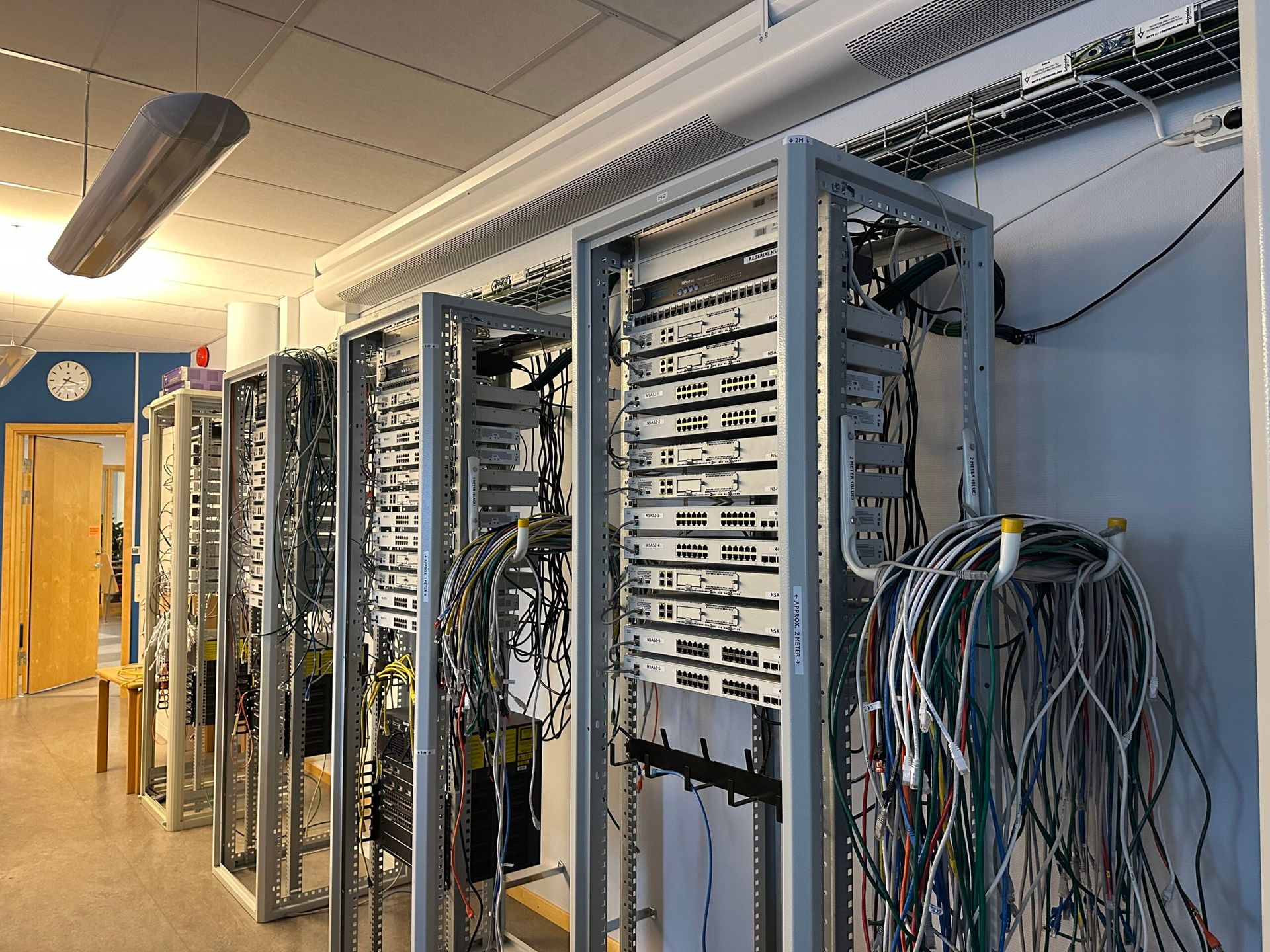 A room full of computer servers lined up