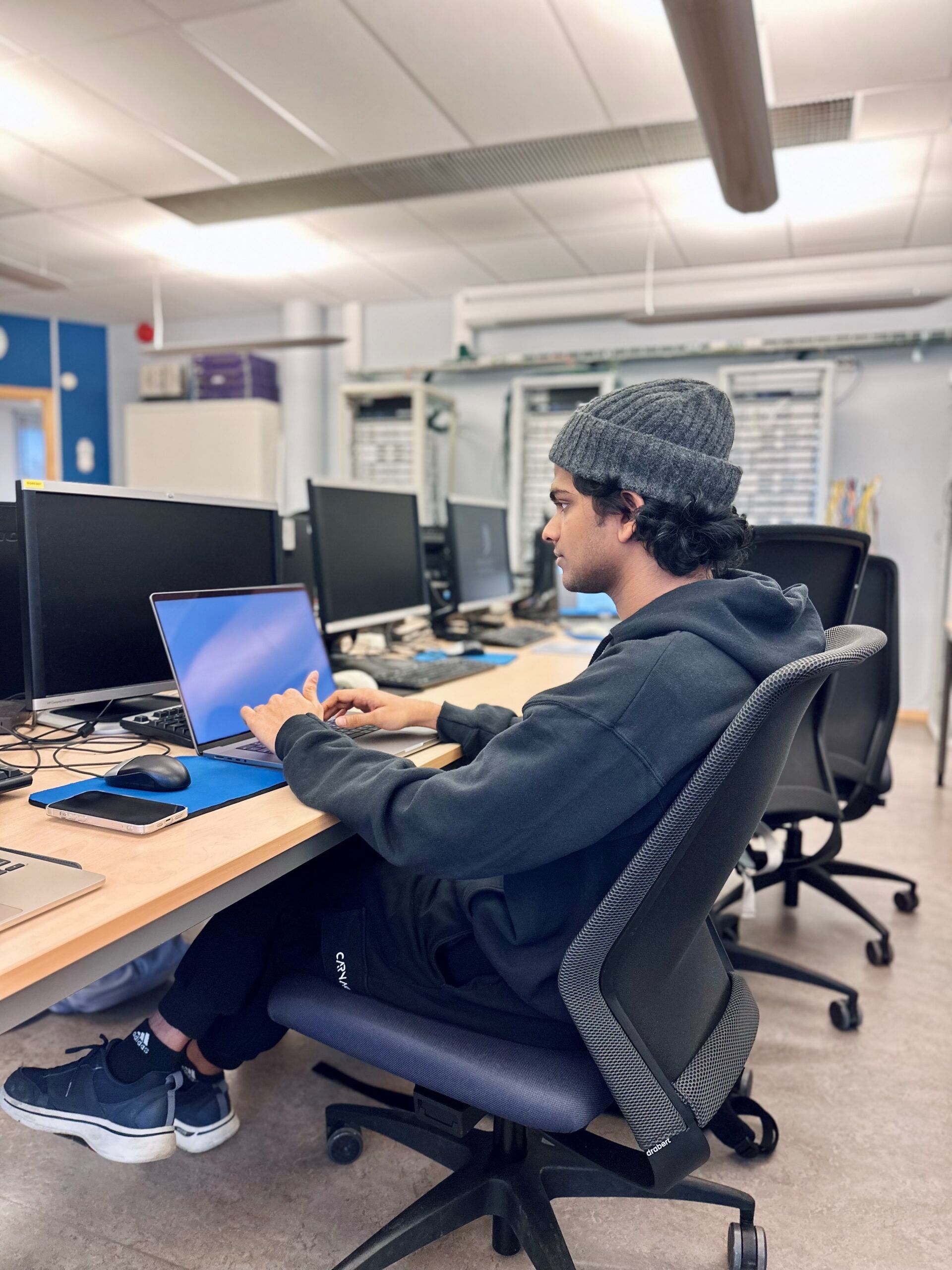 A student working with their laptop