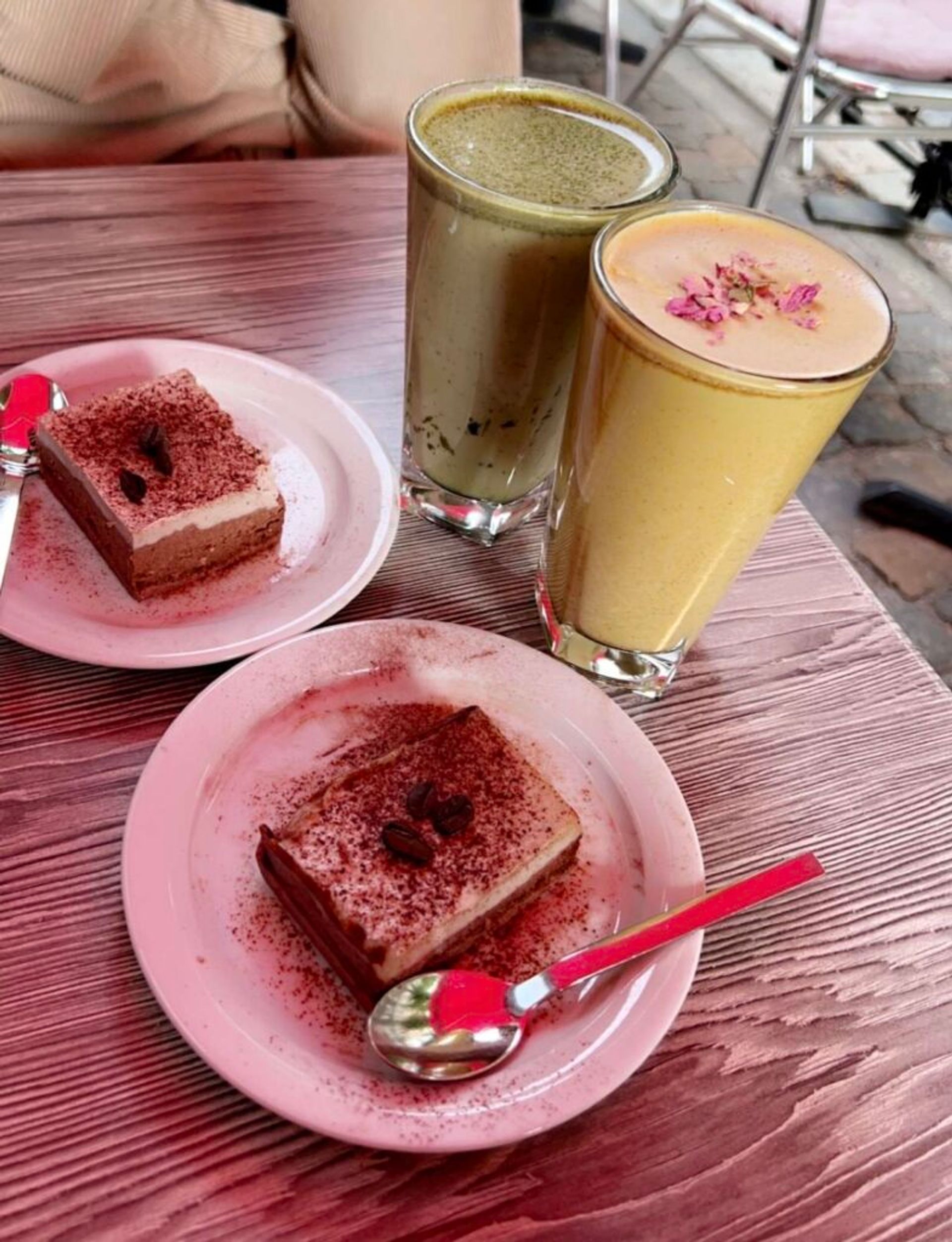 Tiramisu, matcha late, and golden late on a table