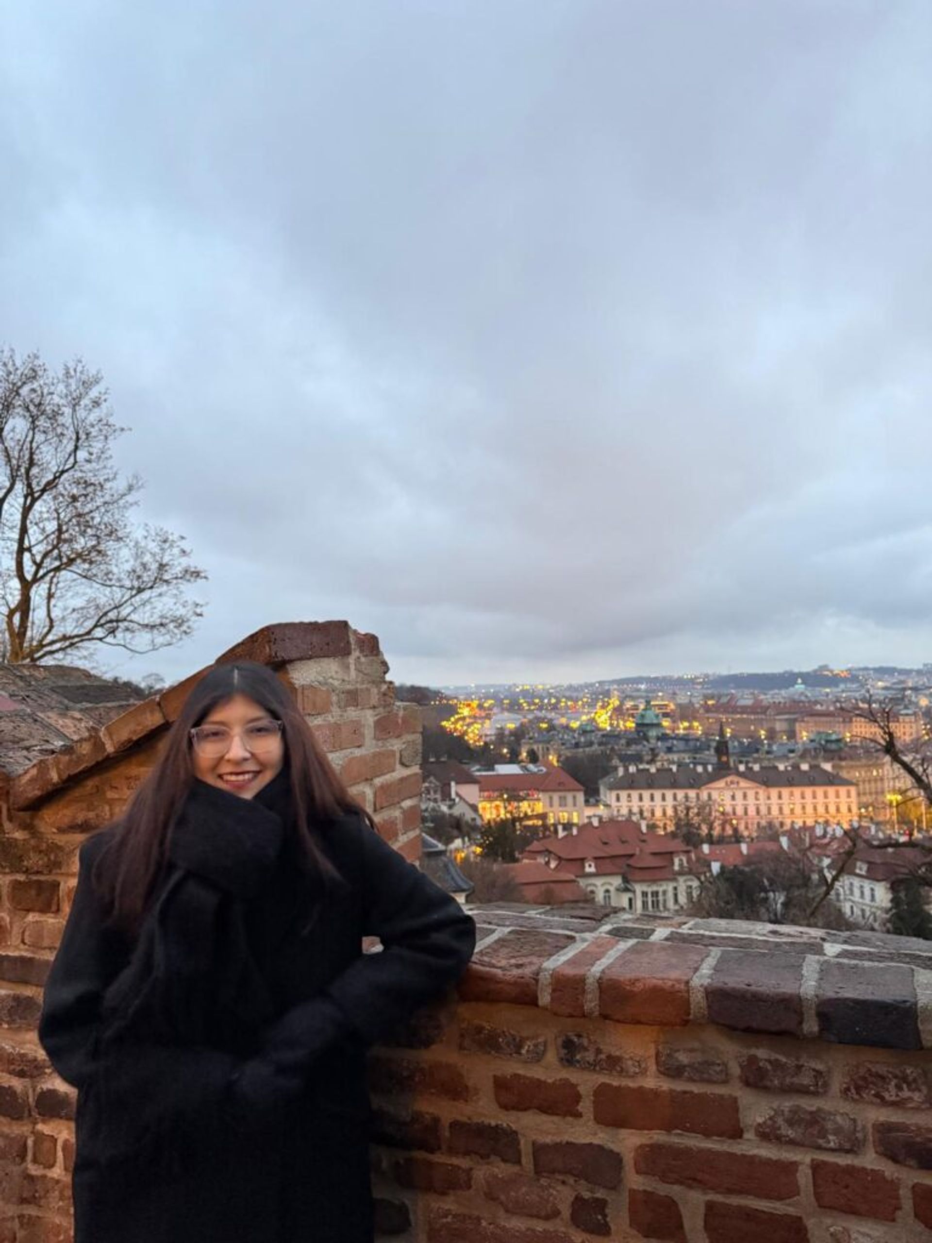 A girl with smile posing for a picture