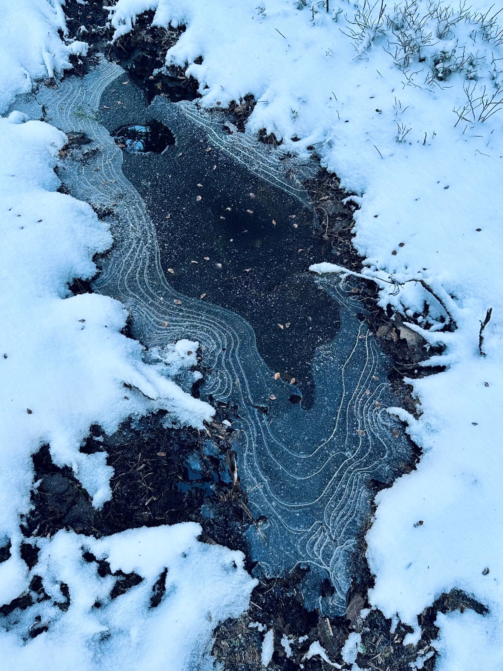 A frozen stream with patterns visible