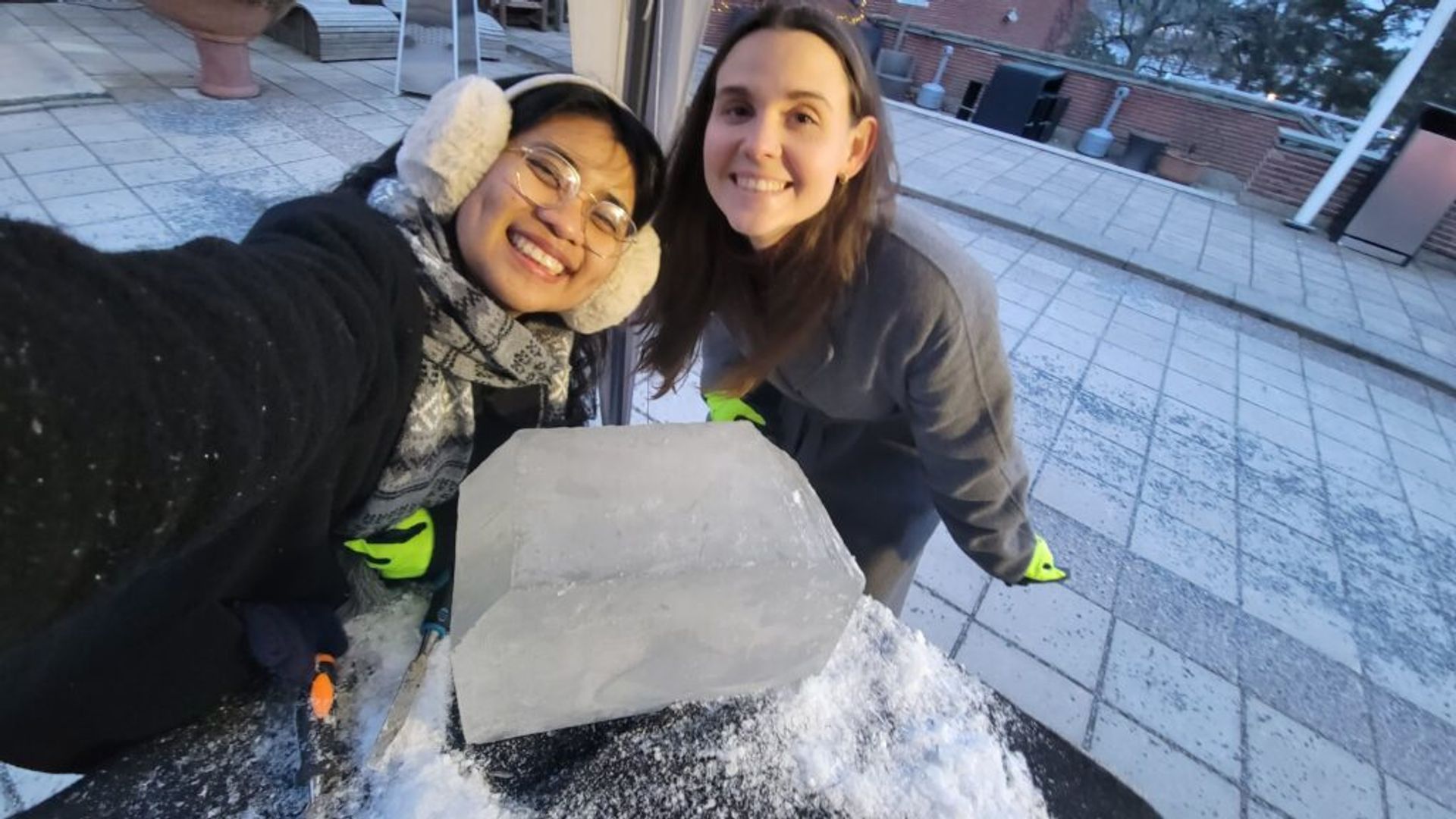 Seflie of two girls with an ice block