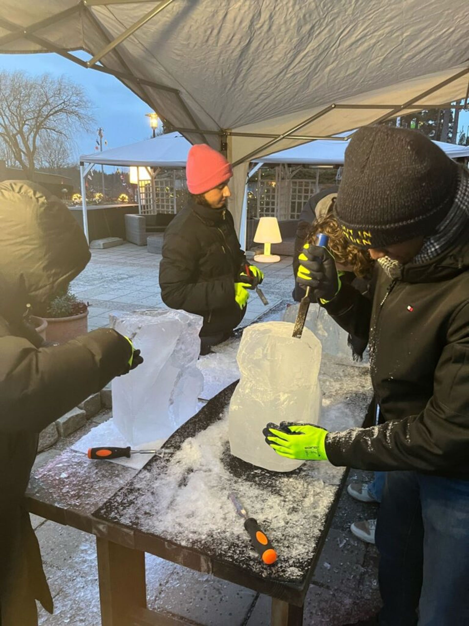 People carving ice