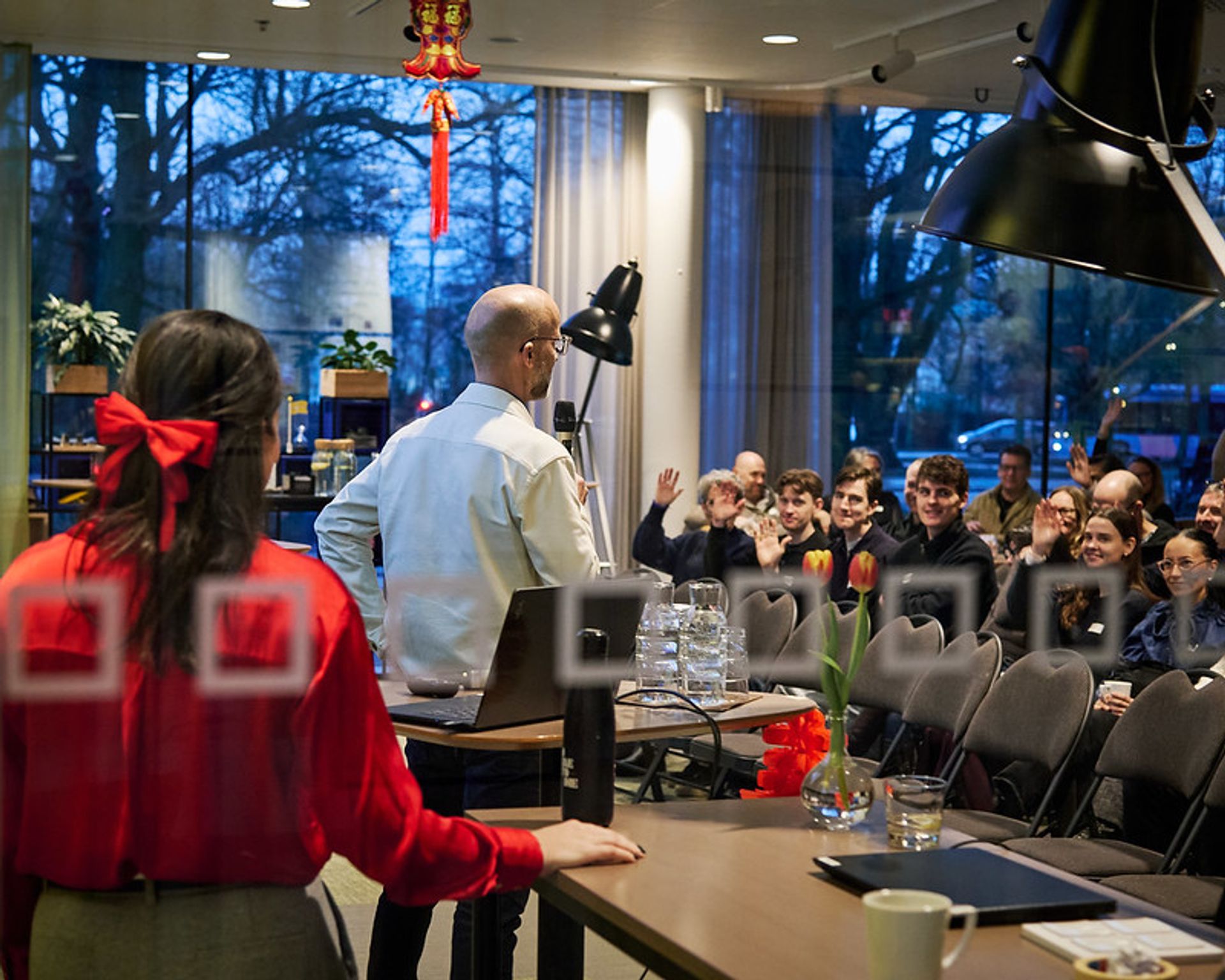 Speakers and a crowd. 