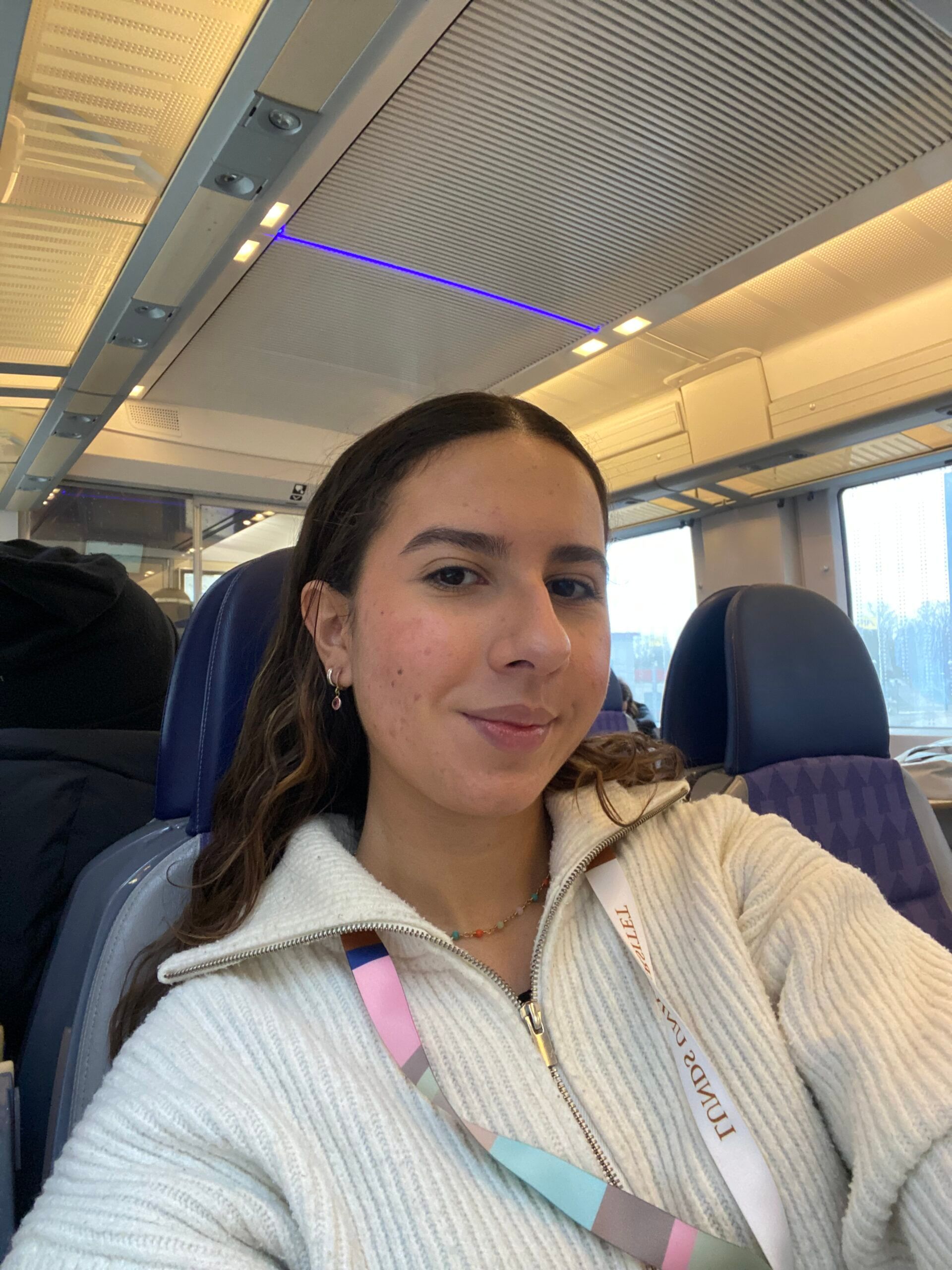 A selfie of a girl on a train