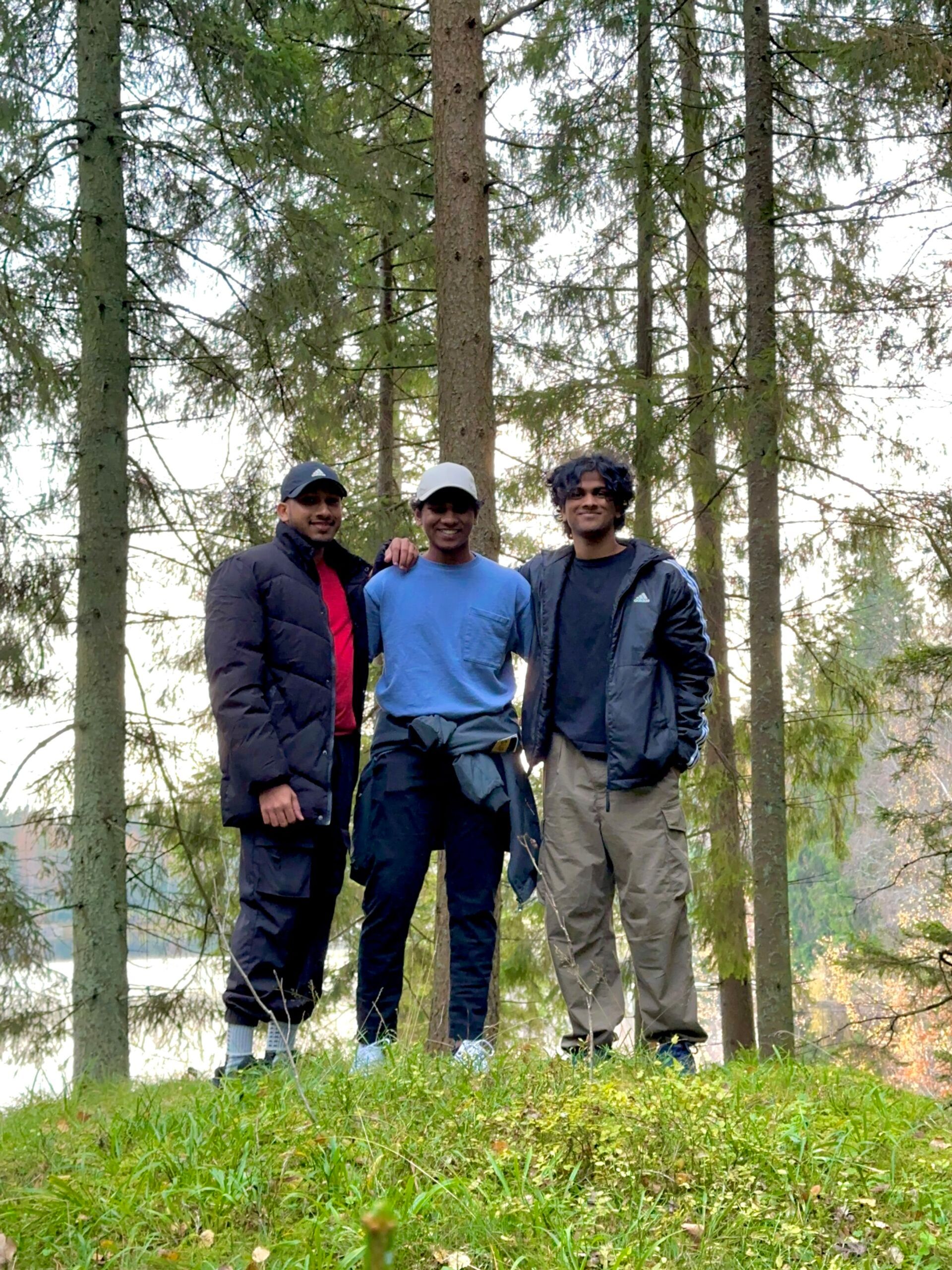 three roommates inside a forest