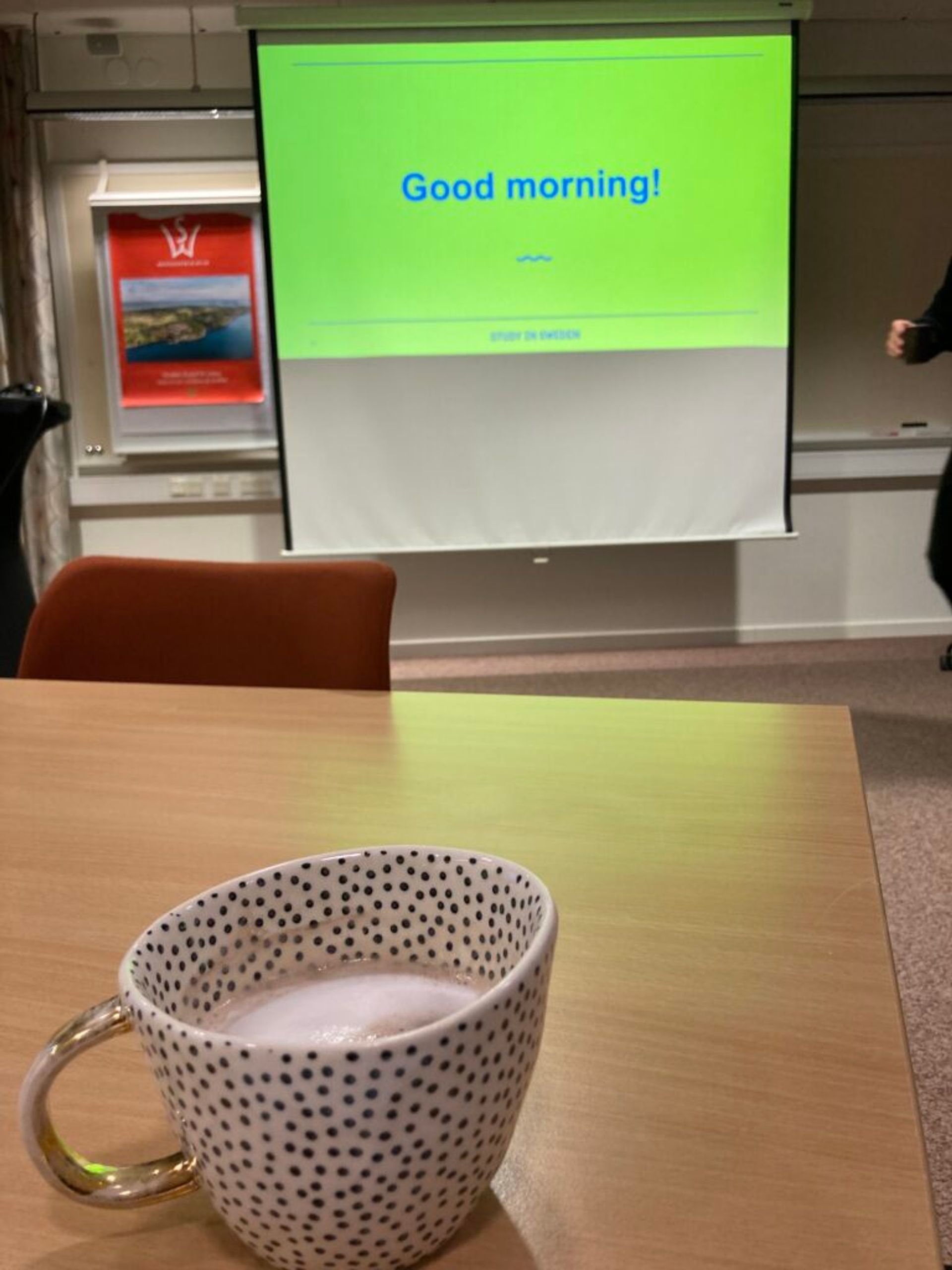 Cup of coffee and a screen