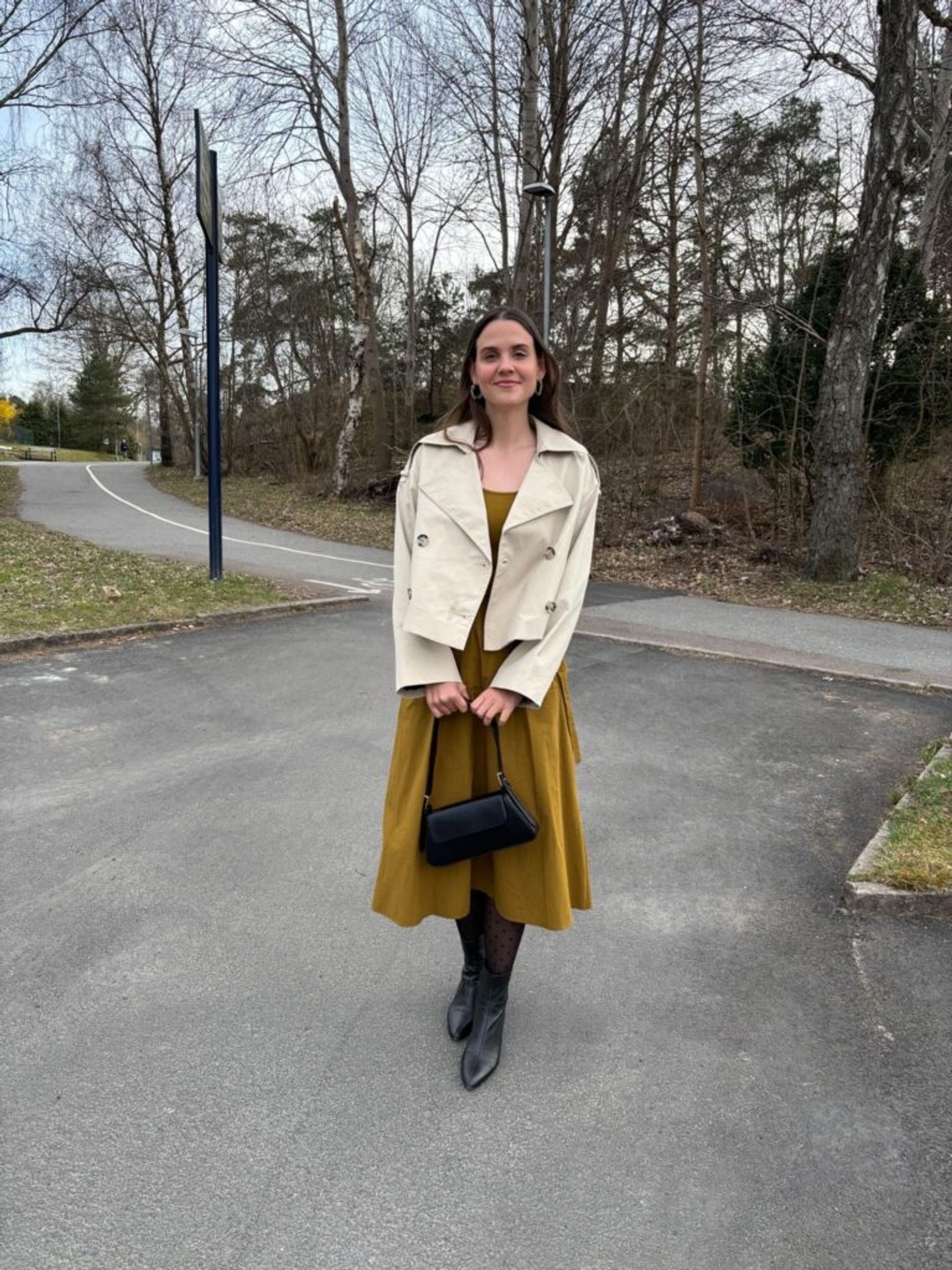 A girl in dress posing