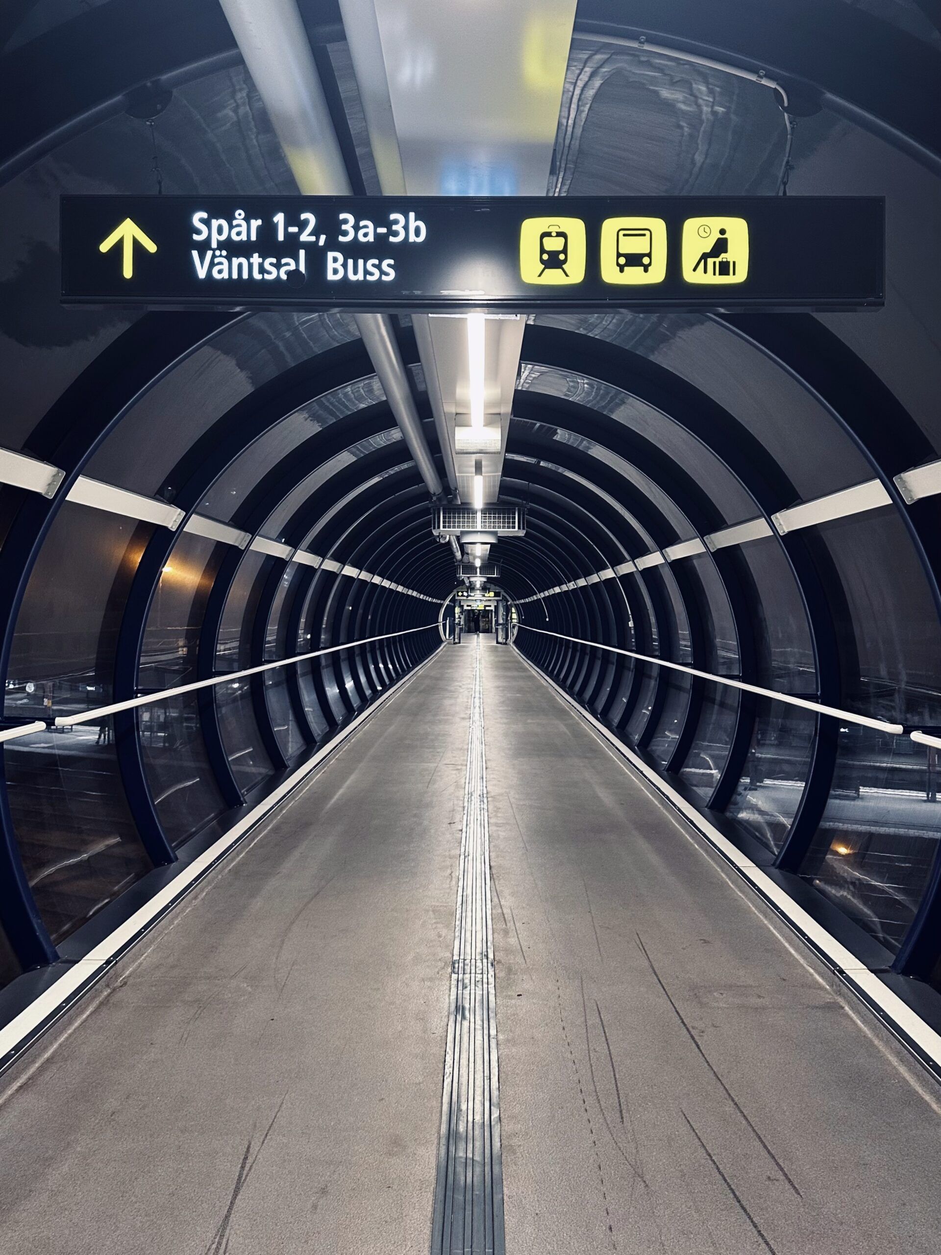 An interior shot of a train station flyover bridge
