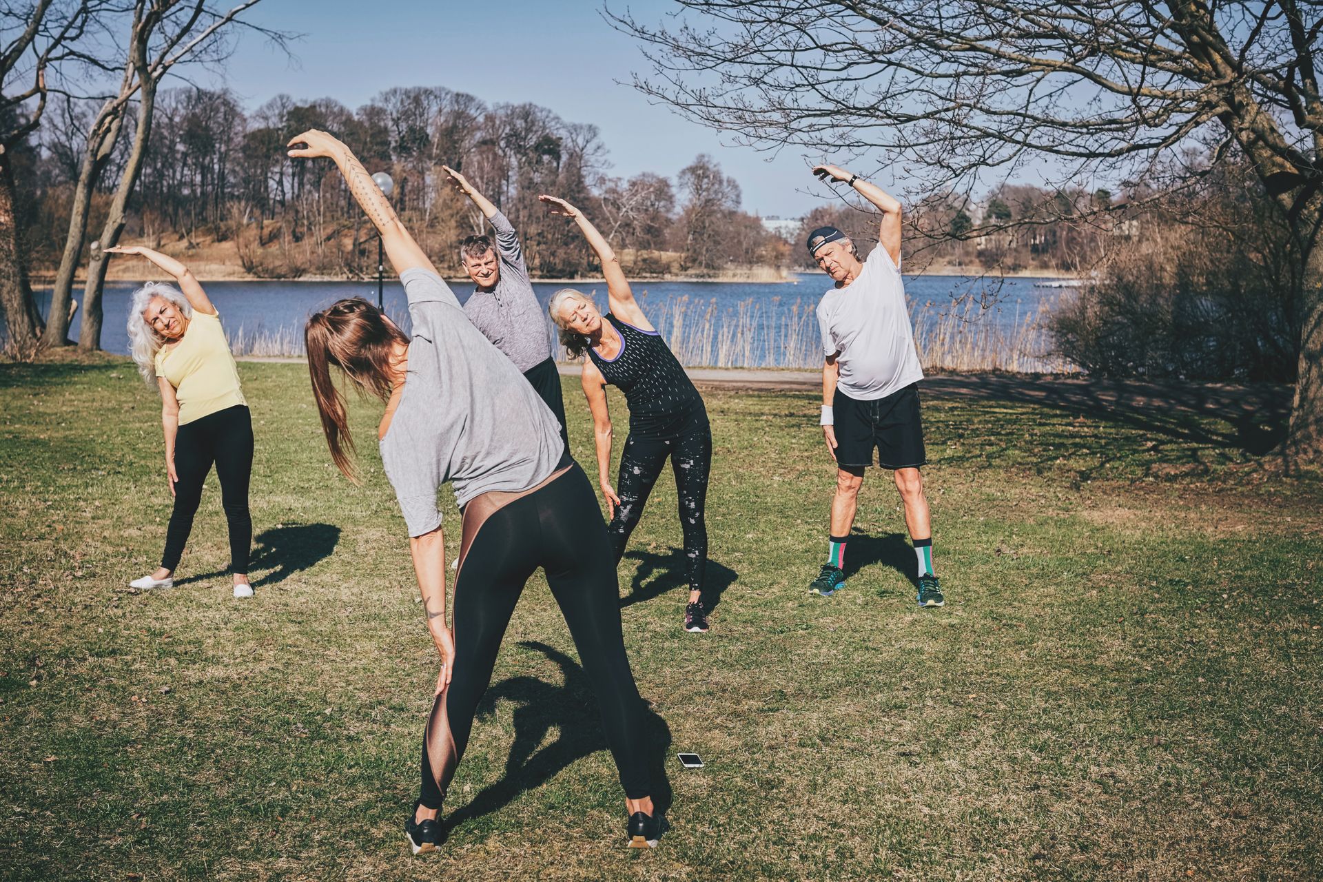 A group of seniors exercising outdoors