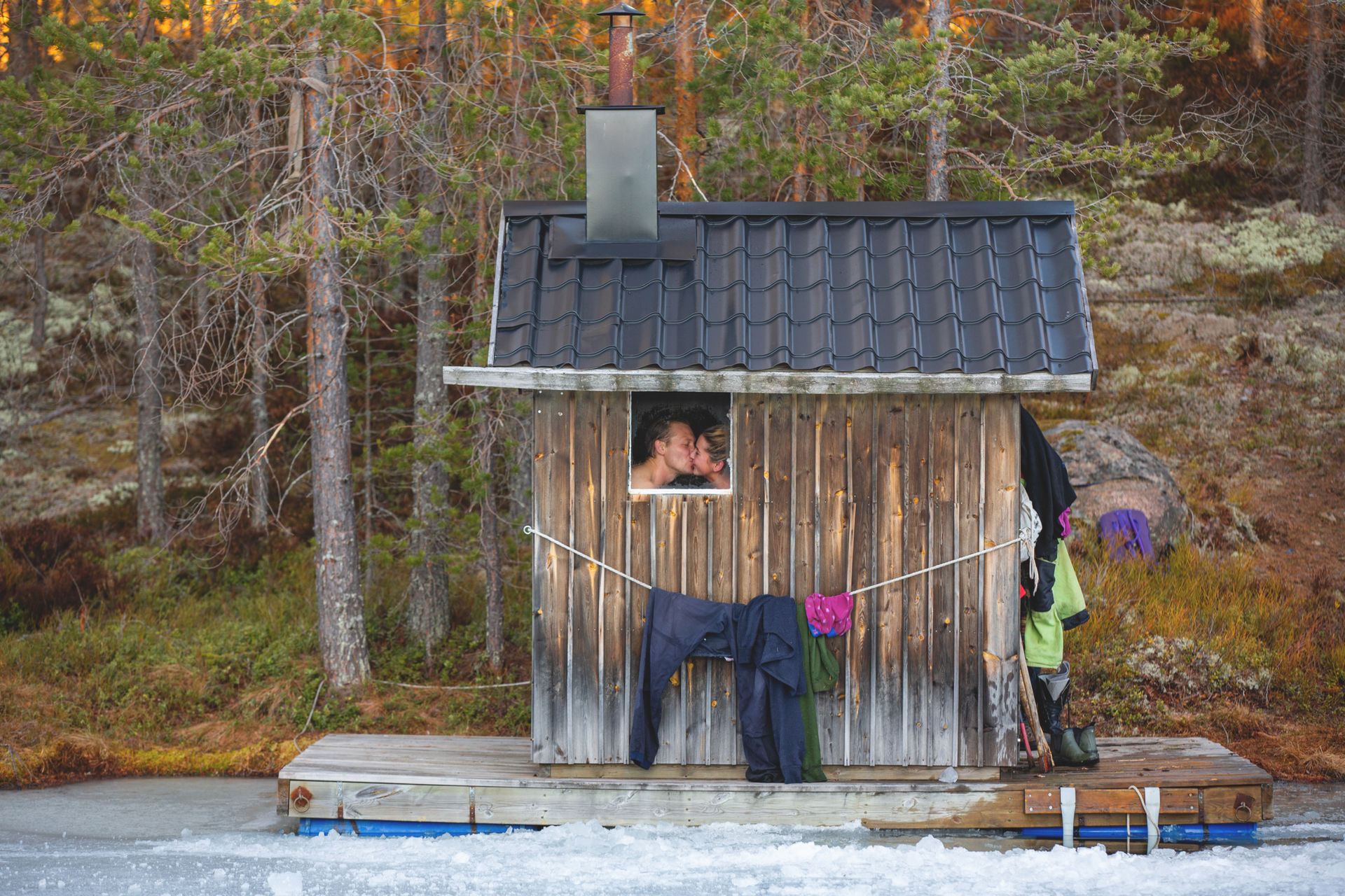 A hut in the woods with a sauna inside 