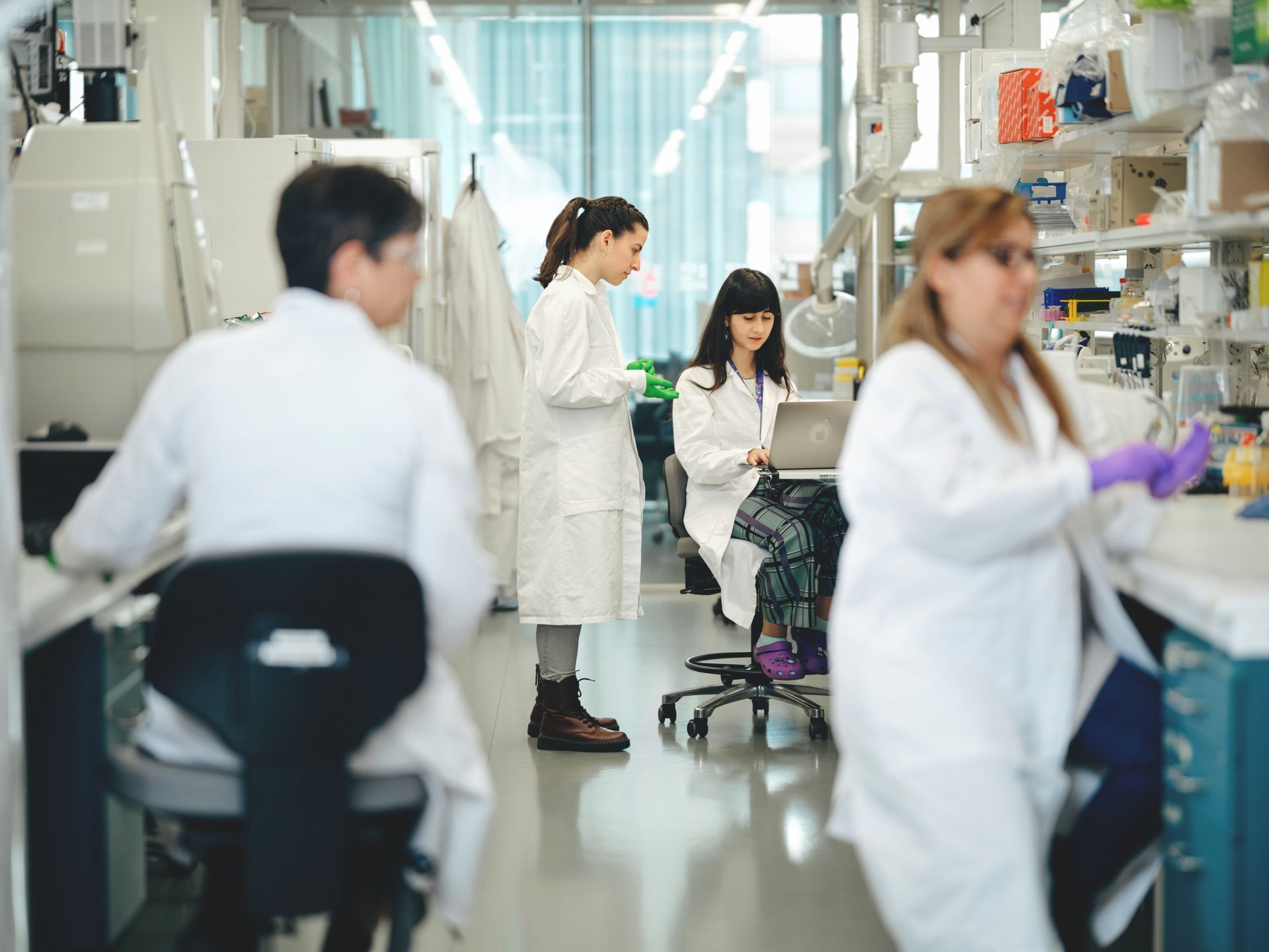 Inside a laboratory with multiple people working